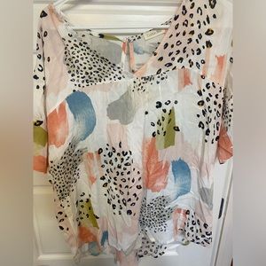 Women’s top size medium. Bought from boutique